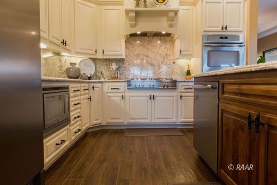 430 West Javis Avenue Ridgecrest, CA 93555 - Photo 13 of 35 a kitchen with granite countertop white cabinets and white appliances