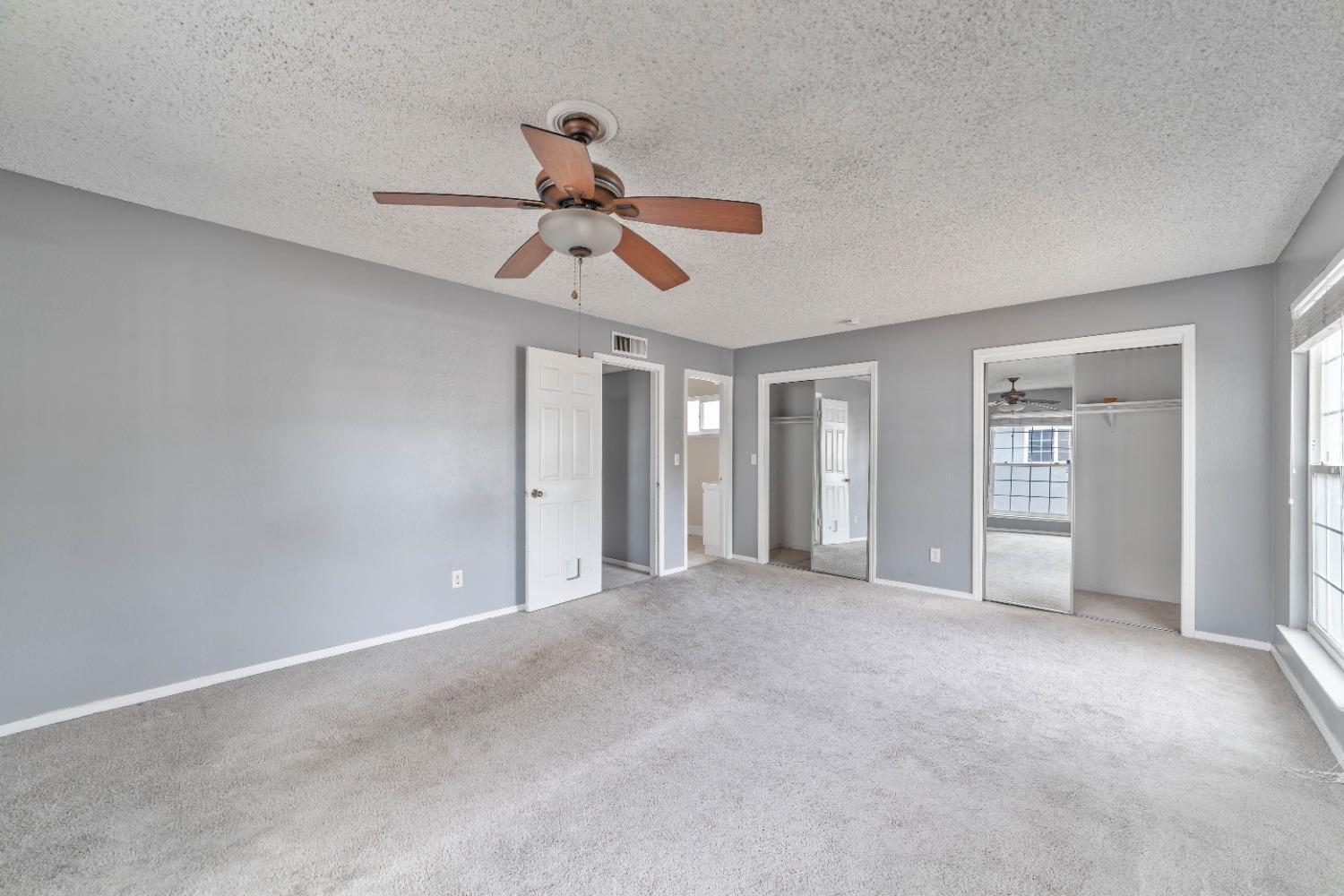 142 West Swift Avenue Clovis, CA 93612 - Photo 11 of 24 a view of empty room with ceiling fan