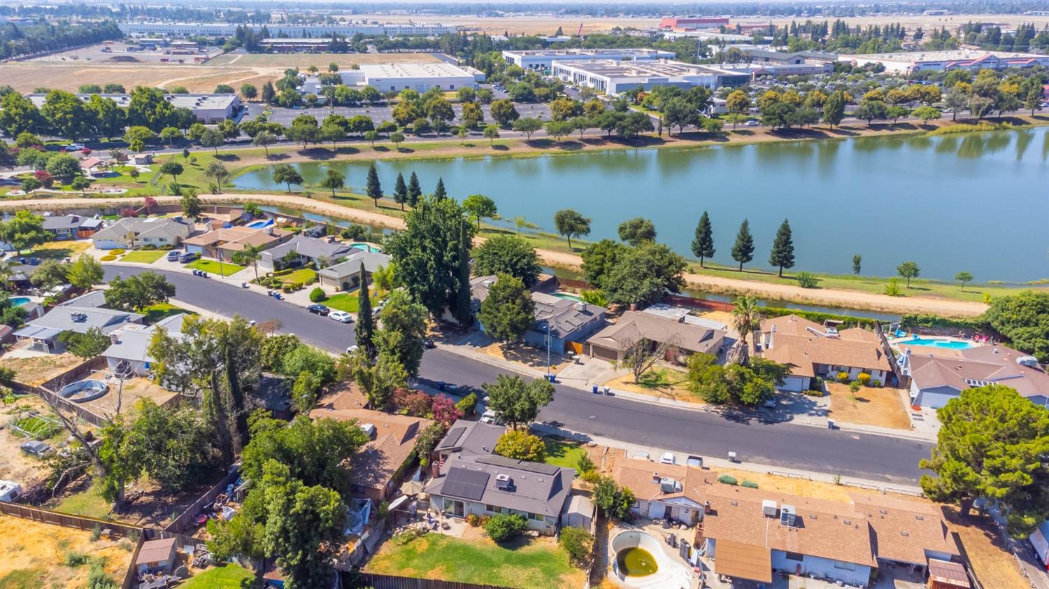 142 West Swift Avenue Clovis, CA 93612 - Photo 20 of 24 an aerial view of a city with lawn chairs