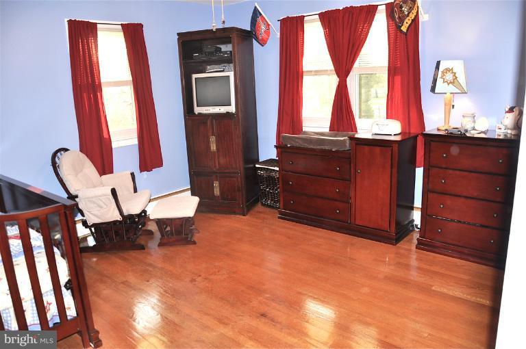 779 Masons Beach Road Deale, MD 20751 - Photo 2 of 14 a living room with furniture and a window
