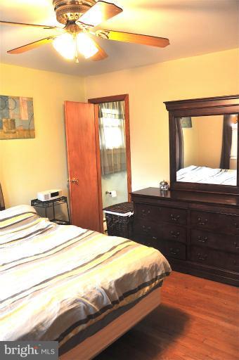 779 Masons Beach Road Deale, MD 20751 - Photo 11 of 14 a bedroom with a bed and a dresser