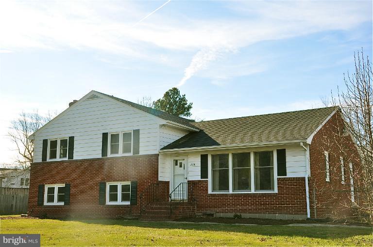 779 Masons Beach Road Deale, MD 20751 - Photo 14 of 14 a view of a house with a yard