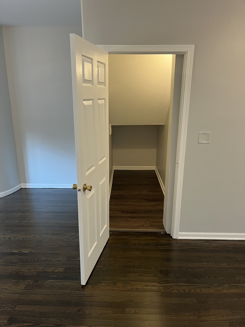 1249 South Kolin Avenue, Unit 1 Chicago, IL 60623 - Photo 12 of 20 a view of an entryway with wooden floor
