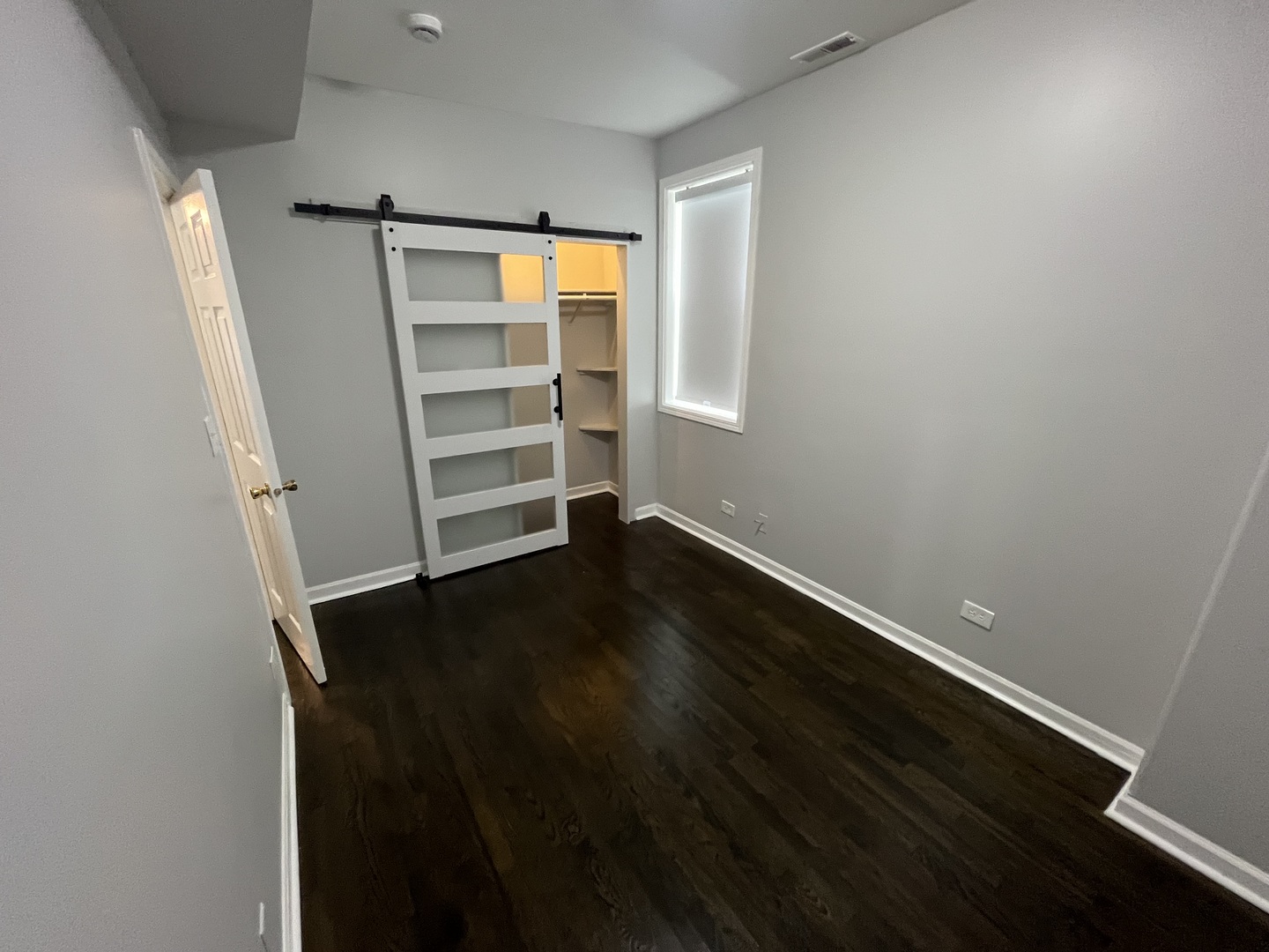 1249 South Kolin Avenue, Unit 1 Chicago, IL 60623 - Photo 15 of 20 a view of walk in closet with empty racks