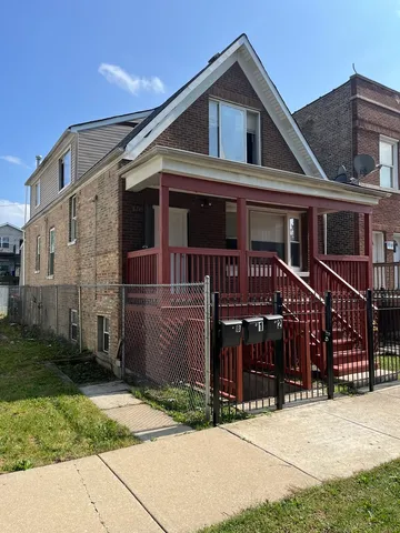 a front view of a house with yard