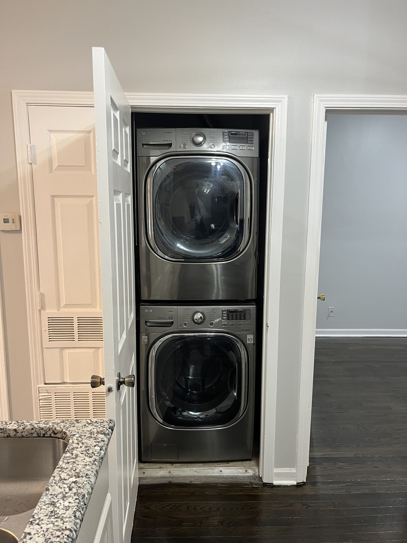 1249 South Kolin Avenue, Unit 1 Chicago, IL 60623 - Photo 8 of 20 a close up view of a washer and dryer
