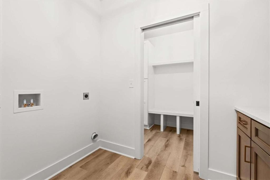 415 Lively Road Waco, GA 30182 - Photo 26 of 49 a view of a room with wooden floor and staircase