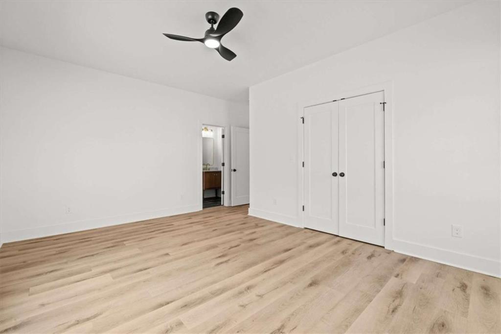 415 Lively Road Waco, GA 30182 - Photo 32 of 49 a view of empty room with wooden floor
