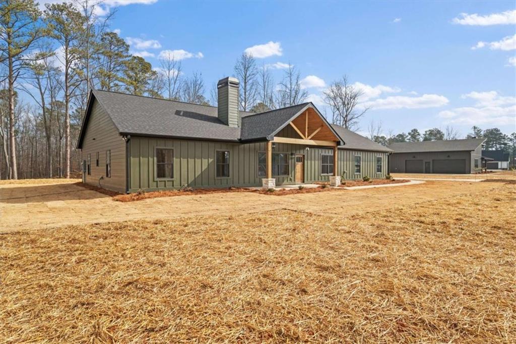 415 Lively Road Waco, GA 30182 - Photo 4 of 49 a front view of a house with a yard