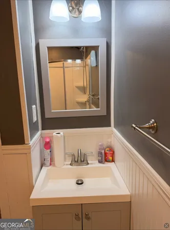 a bathroom with a sink and a bathtub