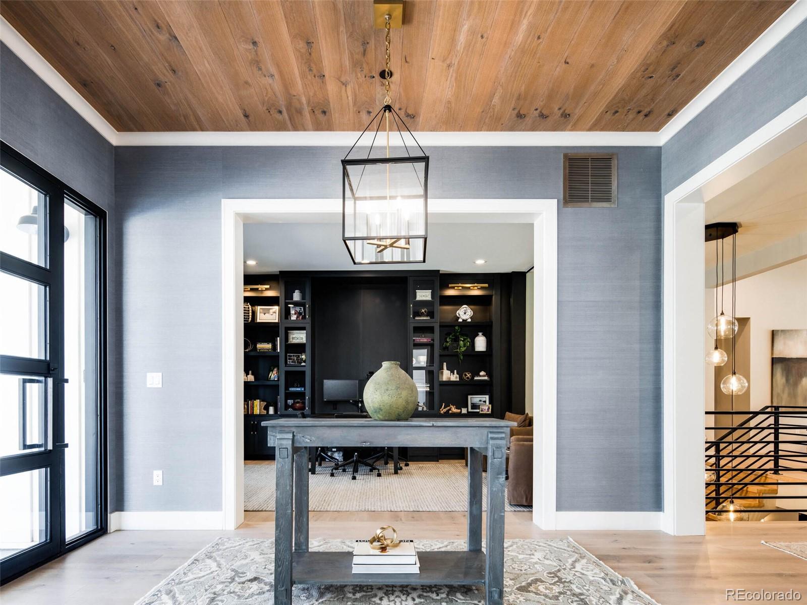 2550 Cherryridge Road Englewood, CO 80113 - Photo 16 of 40 a room with fireplace