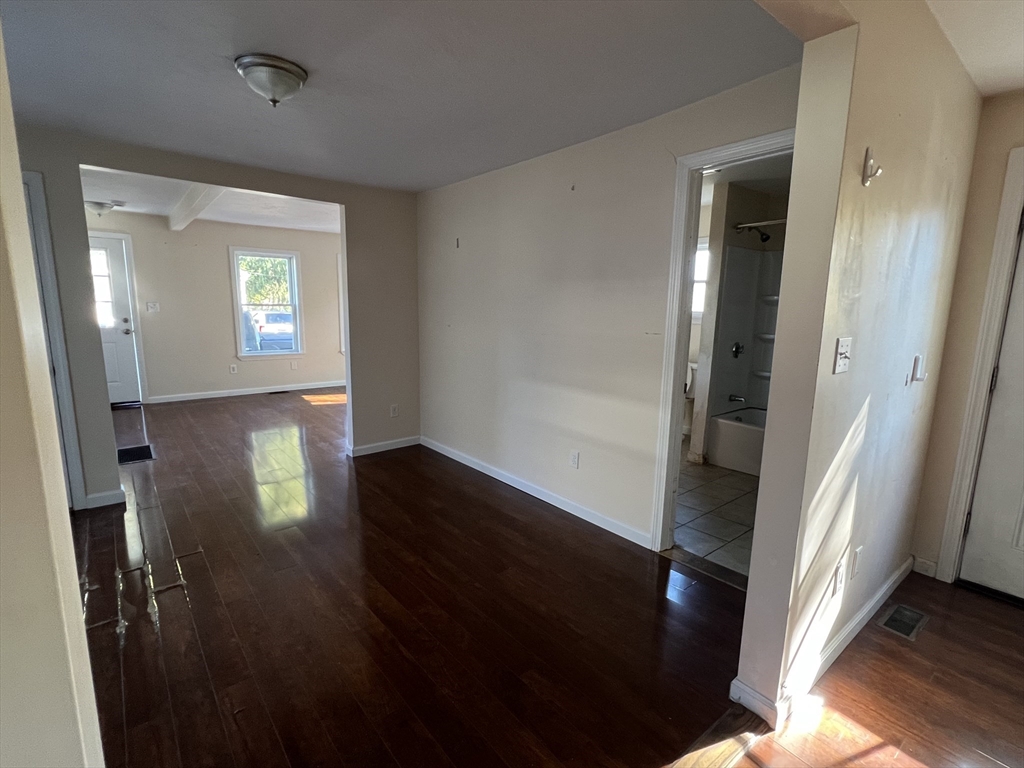 22 Forest Avenue Clinton, MA 01510 - Photo 5 of 13 wooden floor in a hall with an entryway