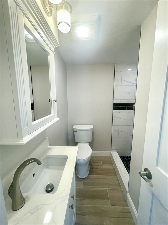 435 Newport Road, Unit 2 Hull, MA 02045 - Photo 12 of 38 a bathroom with a sink and mirror