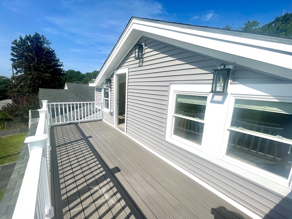435 Newport Road, Unit 2 Hull, MA 02045 - Photo 14 of 38 a view of a wooden deck