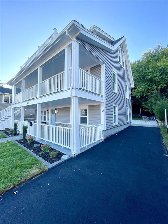 435 Newport Road, Unit 2 Hull, MA 02045 - Photo 2 of 38 a front view of a house with garden