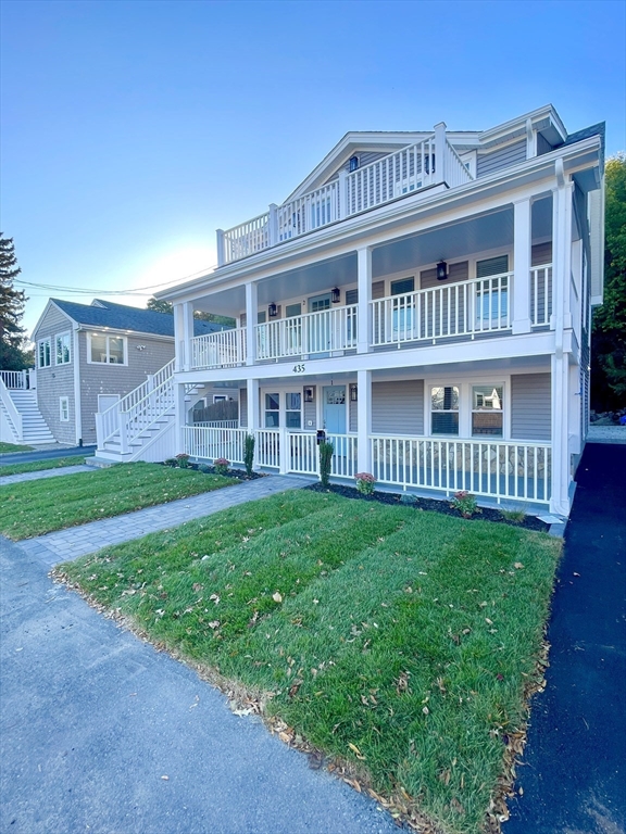 435 Newport Road, Unit 2 Hull, MA 02045 - Photo 35 of 38 a view of an apartment with a big yard and large trees