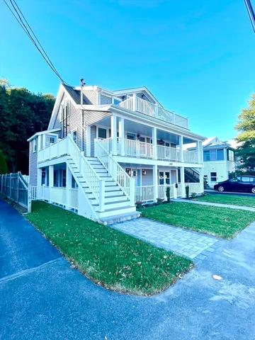 a view of a house with a big yard