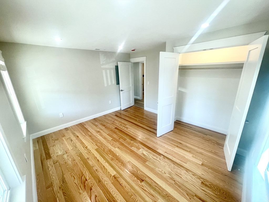 435 Newport Road, Unit 2 Hull, MA 02045 - Photo 10 of 38 a view of a room with wooden floor