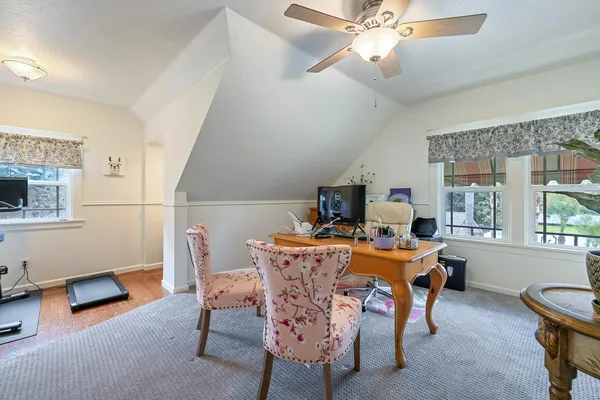 a room with gym equipment and a window