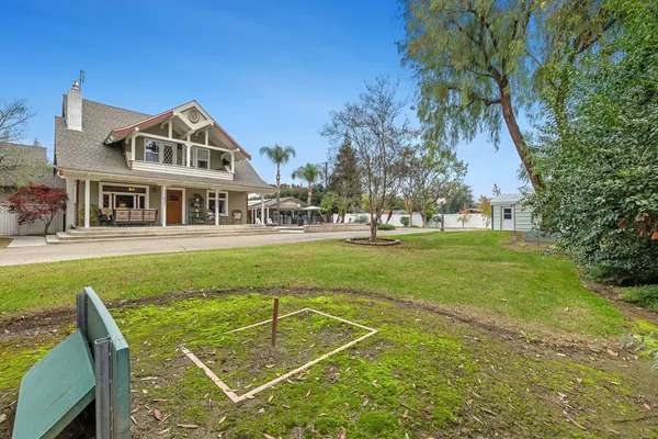 front view of a house with a garden