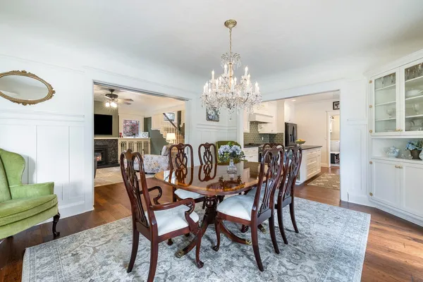 a kitchen with stainless steel appliances granite countertop a sink a stove and a granite counter tops