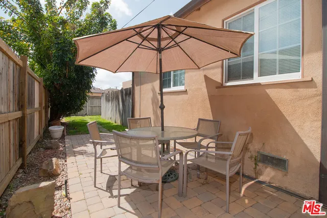 an empty room with wooden floor