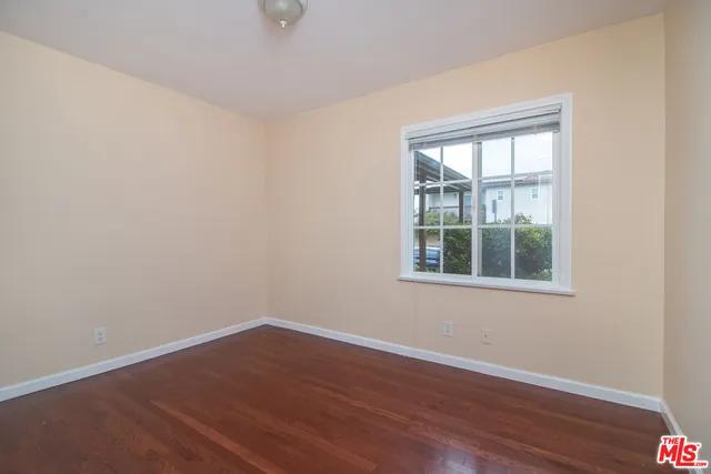 a utility room with a sink and a vanity