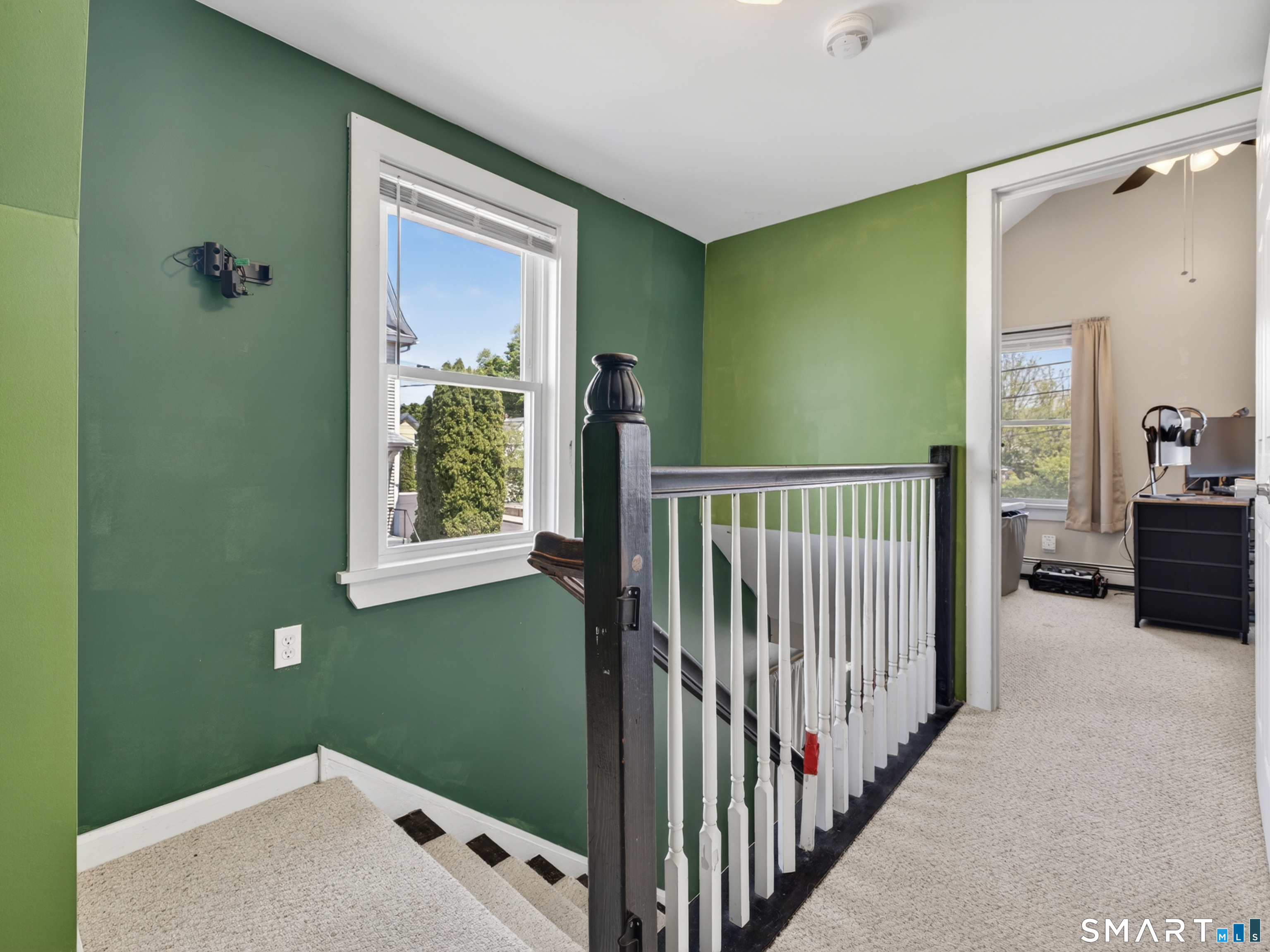 13 Oak Street Groton, CT 06340 - Photo 19 of 38 a view of a hallway with a window and a livingroom view