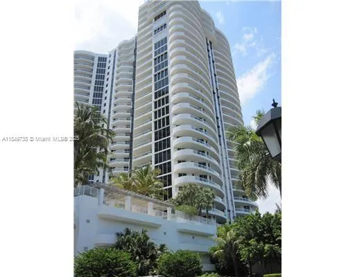an aerial view of a house with yard swimming pool and outdoor seating