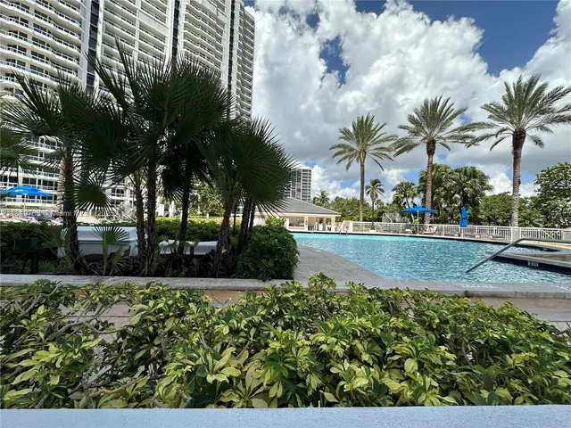a room with furniture and a flat screen tv