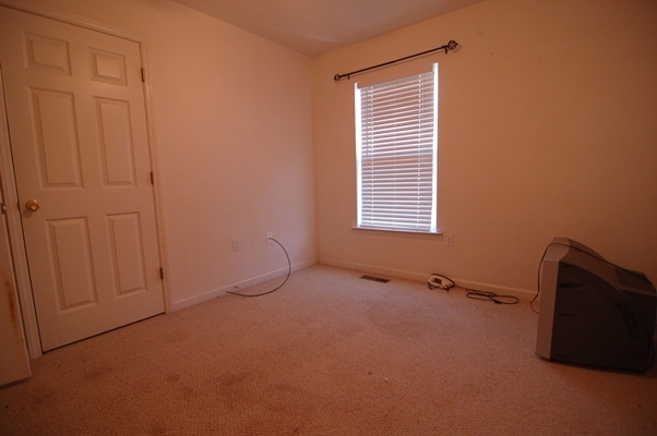 4759 West Westvale Road Northeast Roanoke, VA 24019 - Photo 12 of 13 an empty room with windows