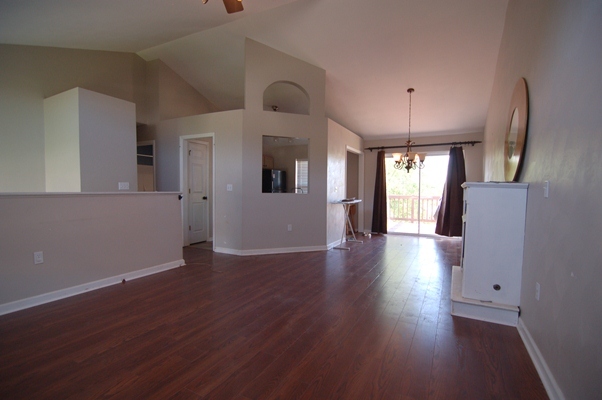 4759 West Westvale Road Northeast Roanoke, VA 24019 - Photo 4 of 13 a view of a hallway with wooden floor and chandelier