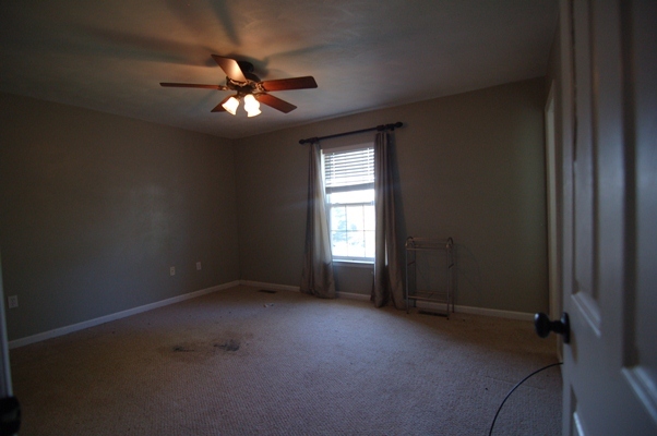 4759 West Westvale Road Northeast Roanoke, VA 24019 - Photo 8 of 13 an empty room with closet and windows