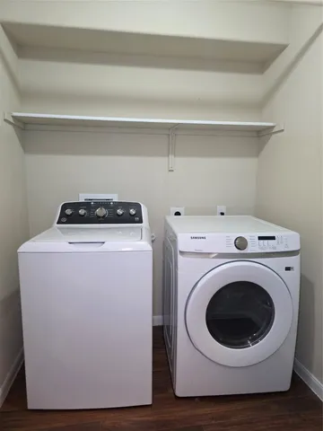 a utility room with dryer and washer