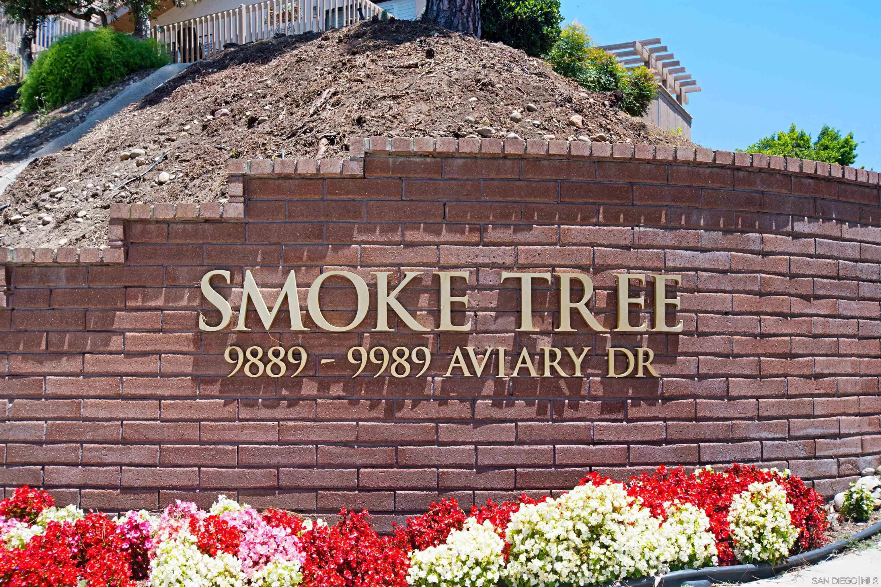 9917 Aviary Drive San Diego, CA 92131 - Photo 37 of 40 a front view of a building with sign