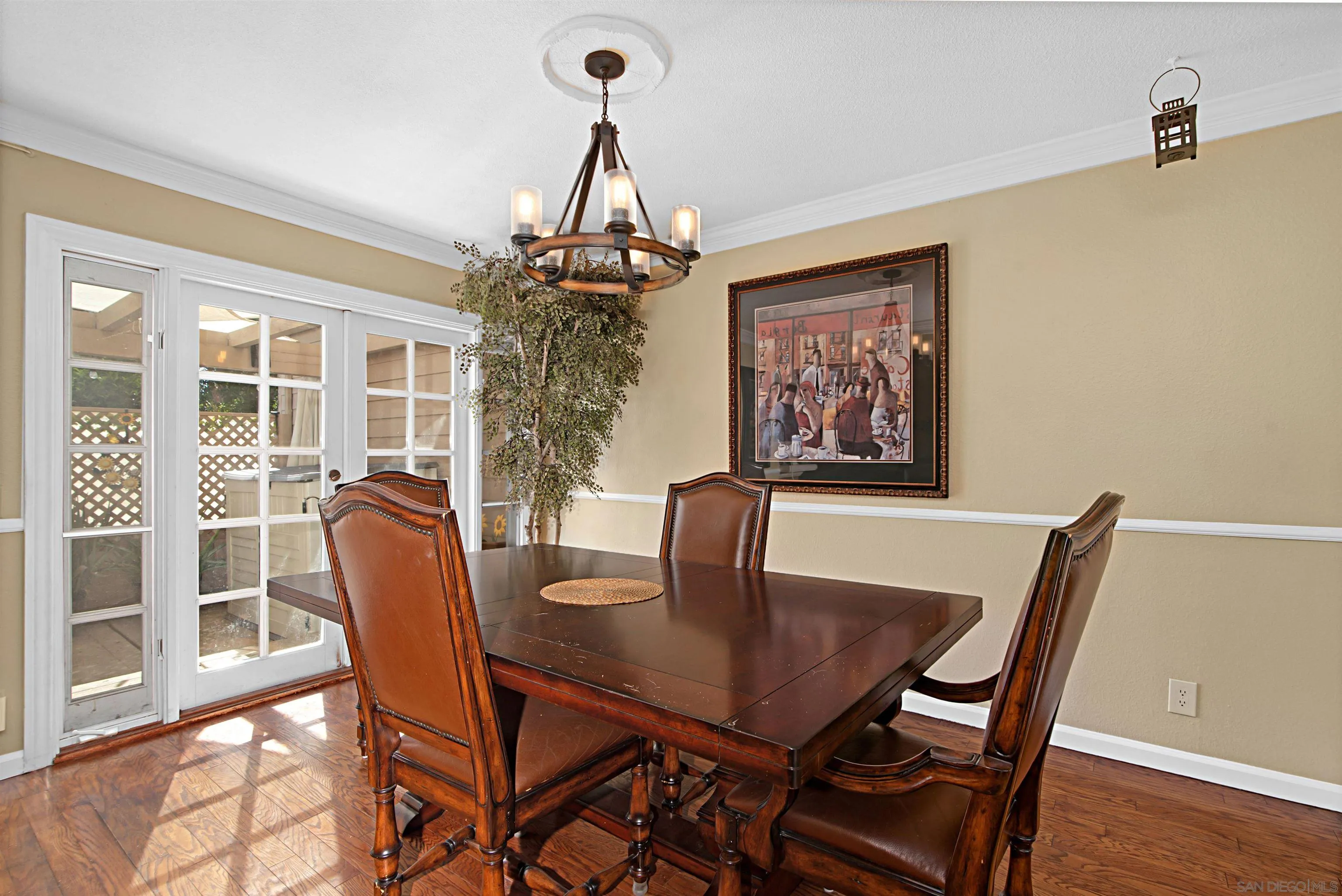 9917 Aviary Drive San Diego, CA 92131 - Photo 8 of 40 a view of a dining room with furniture window and wooden floor