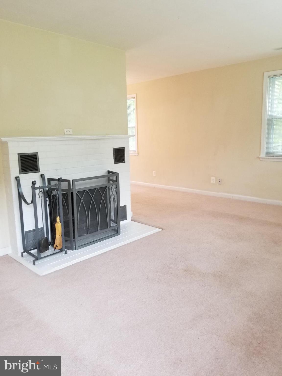291 Charles Hall Road Millersville, MD 21108 - Photo 3 of 29 Living room with fireplace
