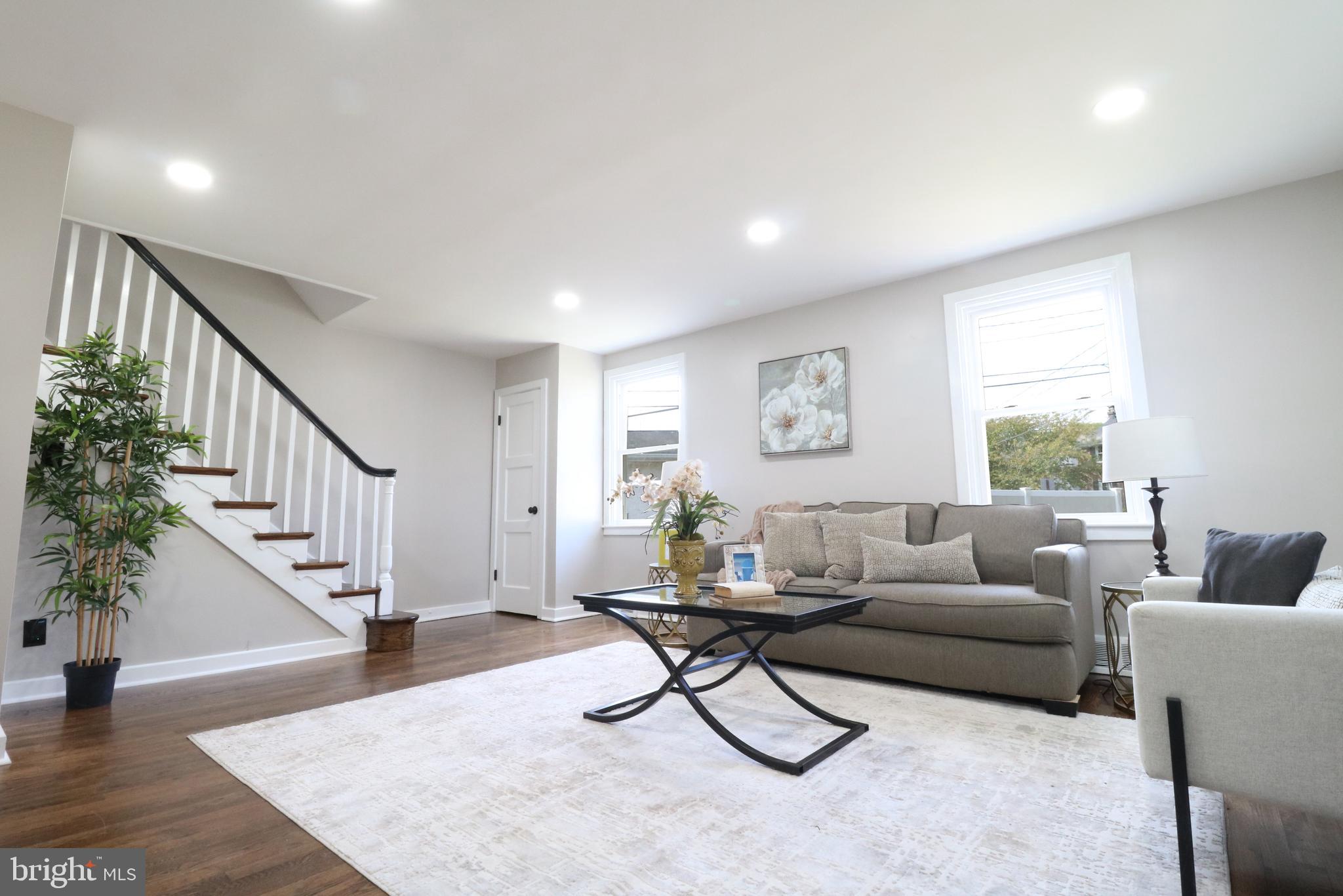 1016 Lamb Road Secane, PA 19018 - Photo 13 of 41 a living room with furniture and a potted plant