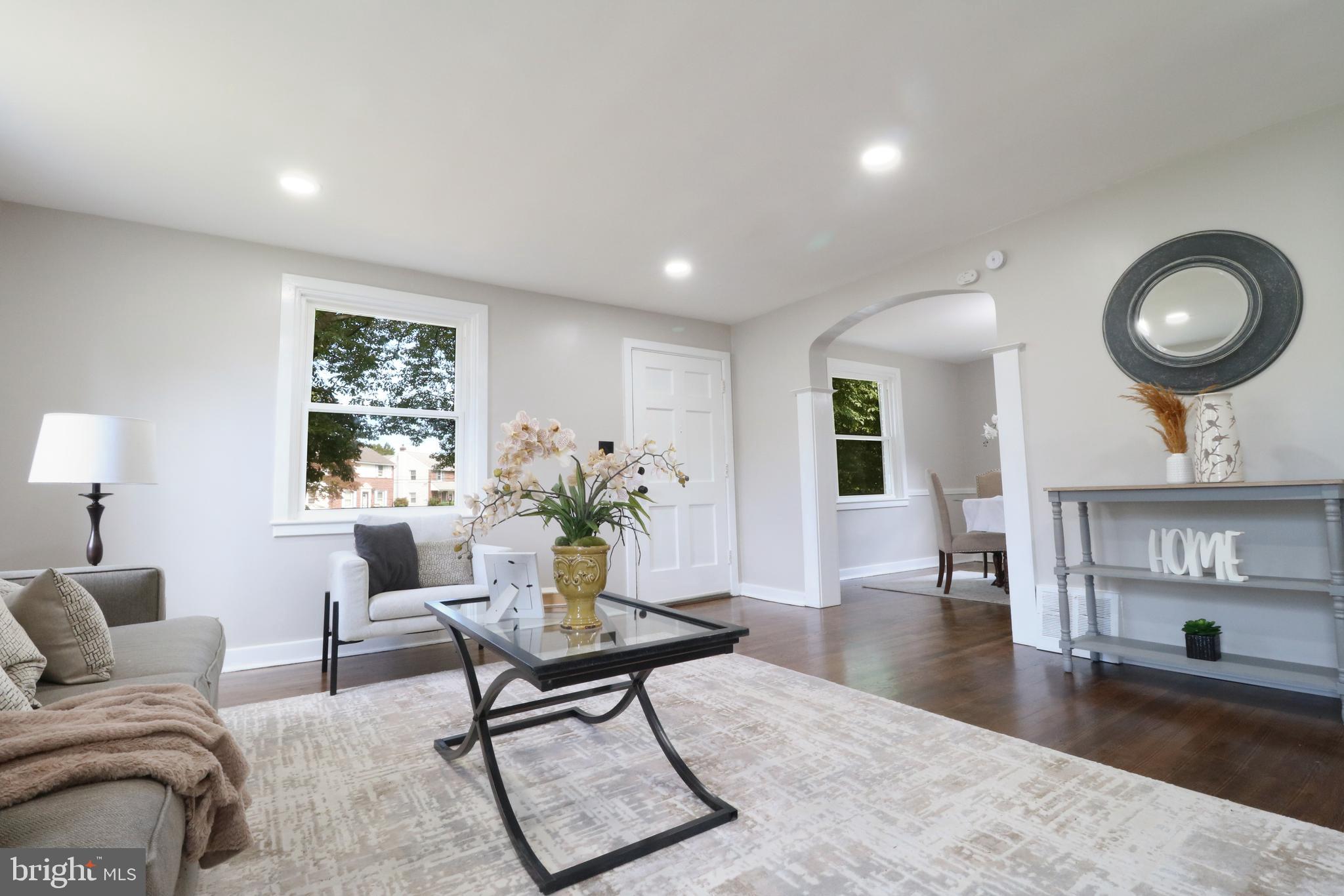 1016 Lamb Road Secane, PA 19018 - Photo 15 of 41 a living room with furniture and a large window