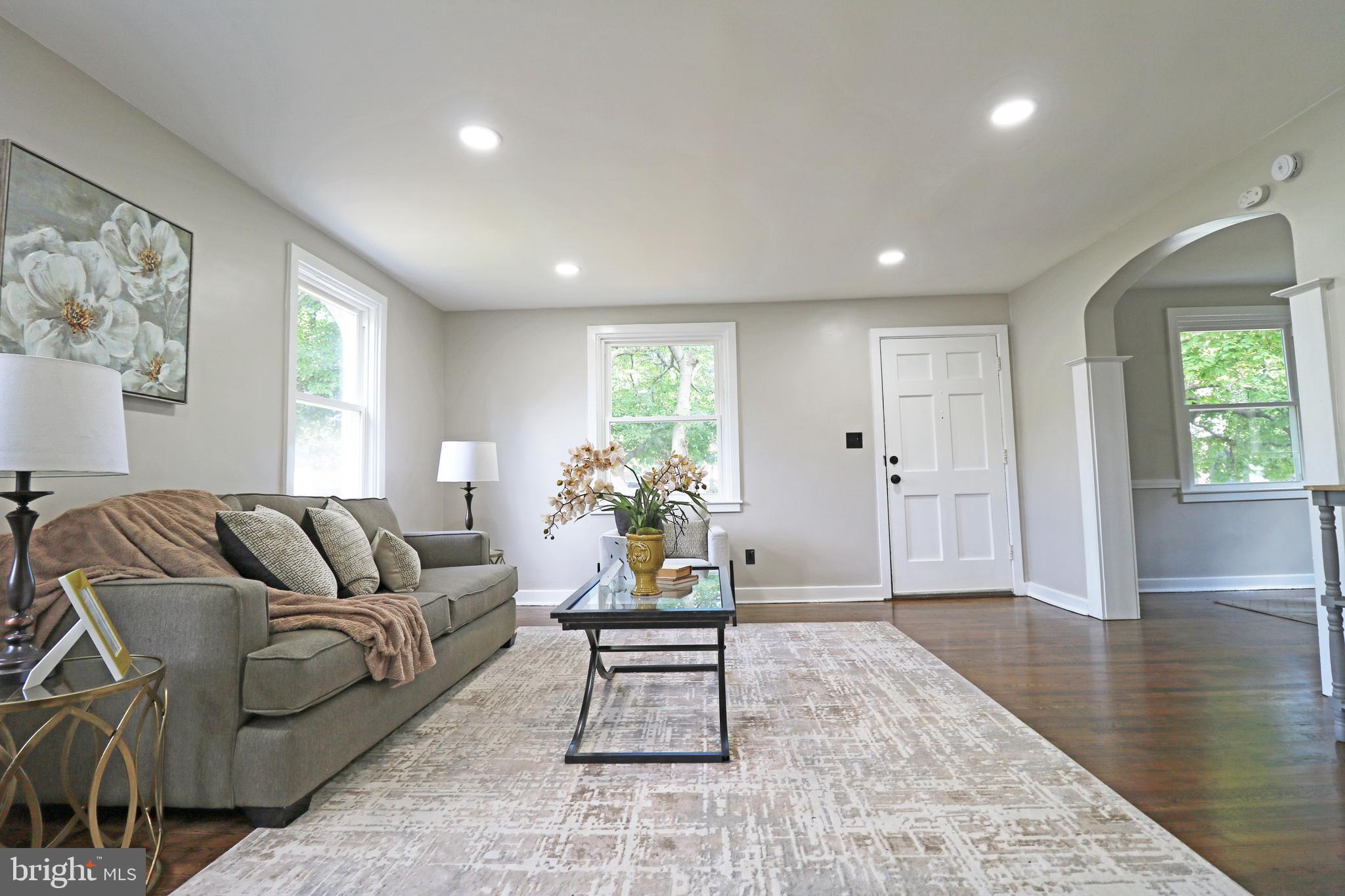 1016 Lamb Road Secane, PA 19018 - Photo 16 of 41 a living room with furniture and wooden floor