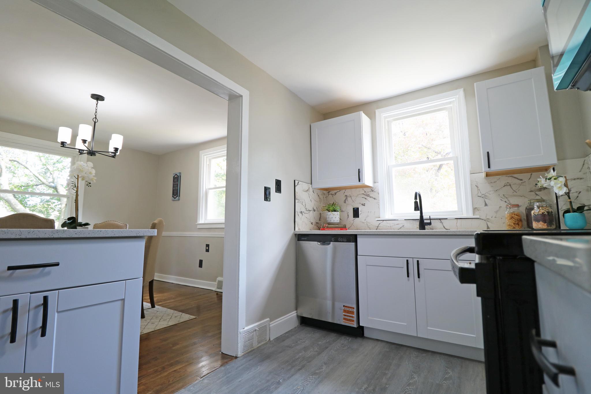 1016 Lamb Road Secane, PA 19018 - Photo 20 of 41 a kitchen with a sink cabinets and window