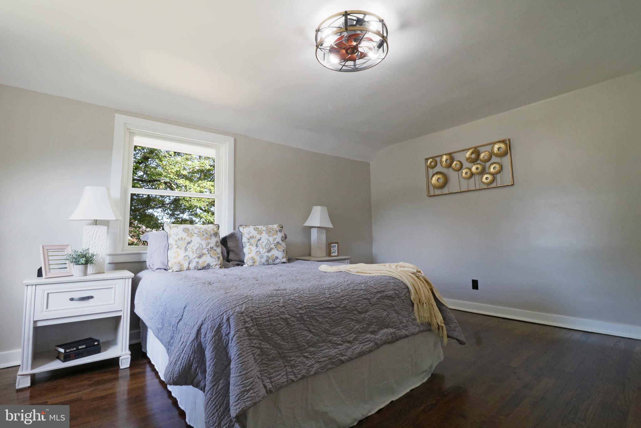 1016 Lamb Road Secane, PA 19018 - Photo 28 of 41 a bedroom with a large bed and a window