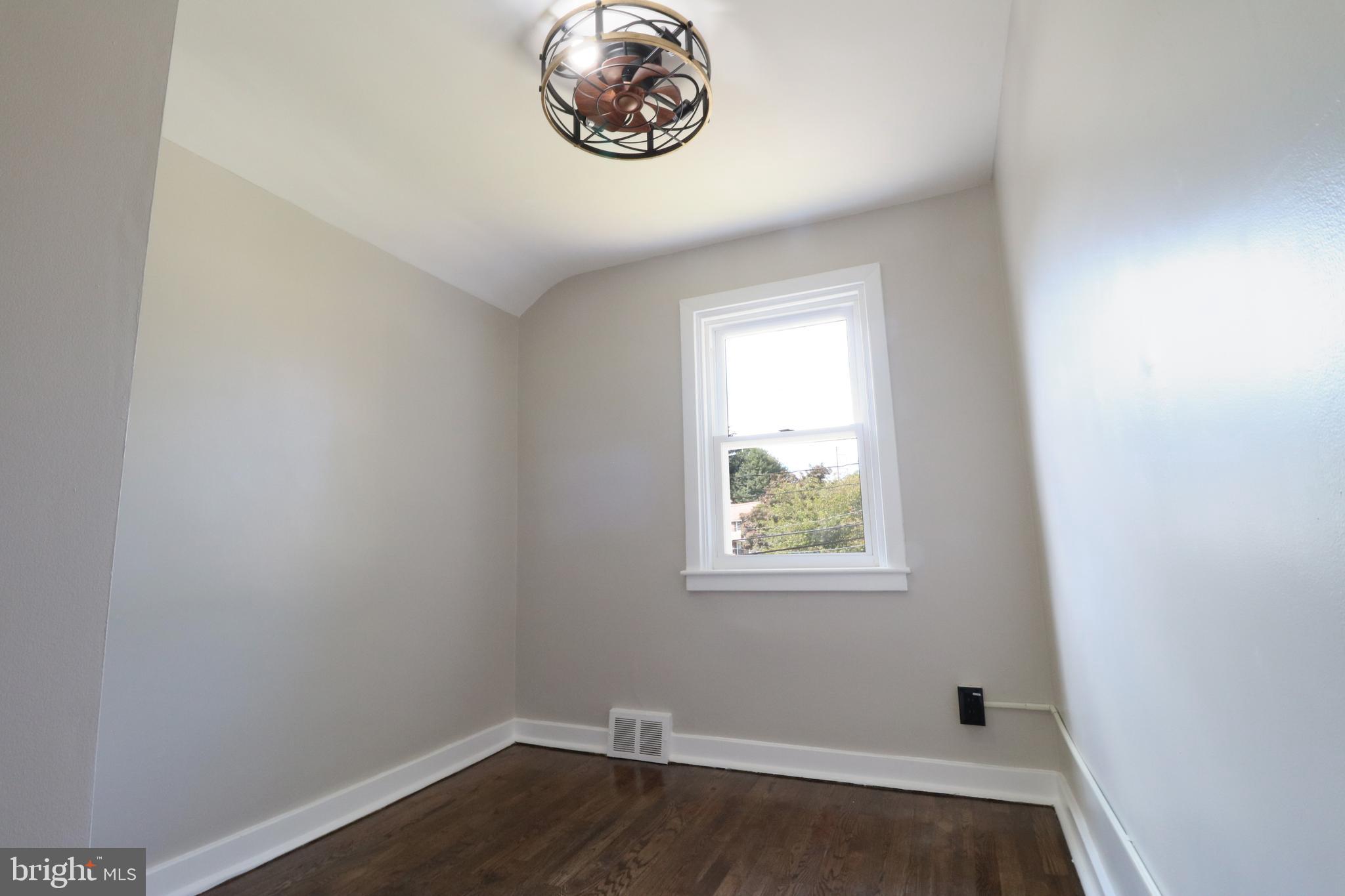 1016 Lamb Road Secane, PA 19018 - Photo 33 of 41 an empty room with a window