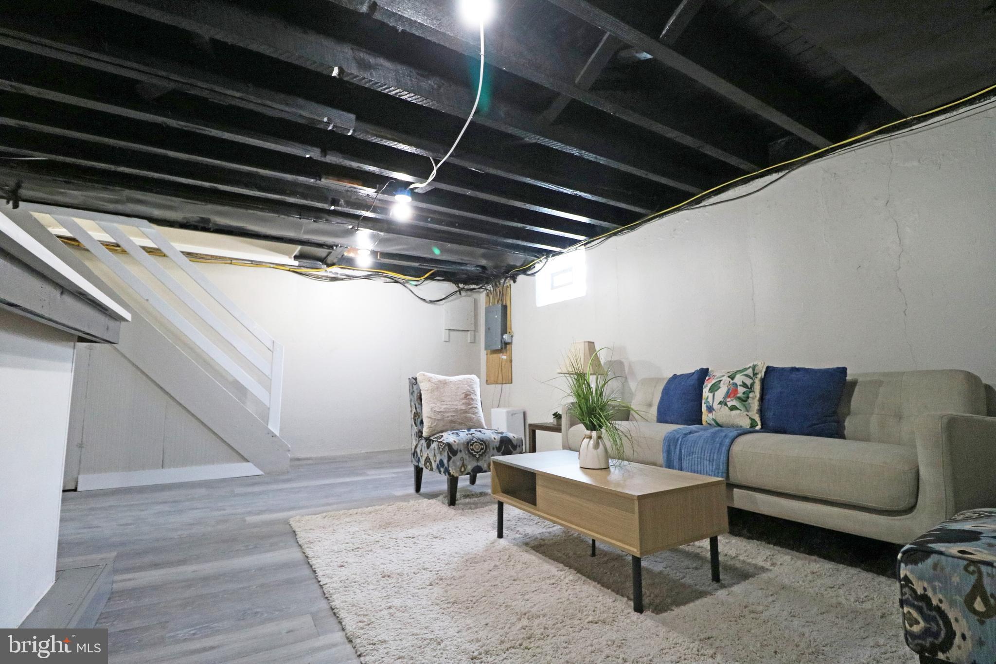 1016 Lamb Road Secane, PA 19018 - Photo 35 of 41 a living room with furniture and a rug