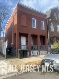 331 Watson Avenue, Unit 1 Perth Amboy, NJ 08861 - Photo 1 of 4 a front view of a house