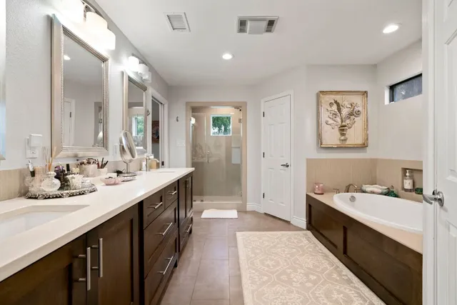 a bedroom with bed and window
