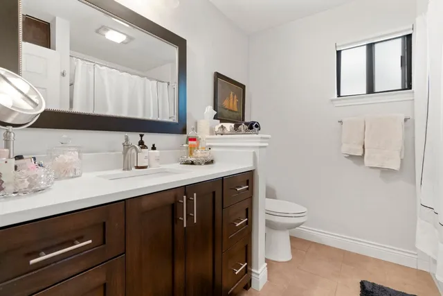 a view of a workspace with furniture