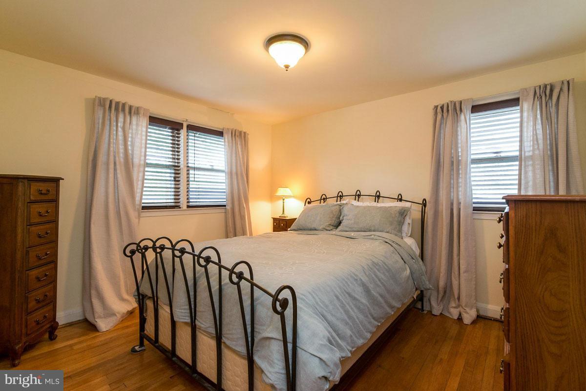 1561 Clairidge Road Baltimore, MD 21207 - Photo 14 of 28 a bedroom with a bed and a window