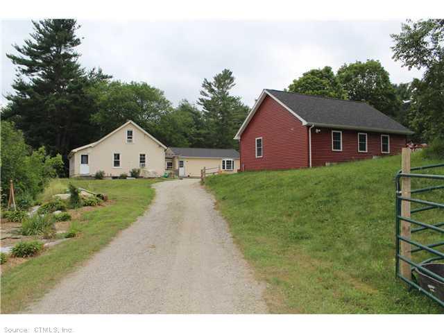 201 Valley Road Killingly, CT 06239 - Photo 1 of 1 a view of a yard in front of a house with a yard