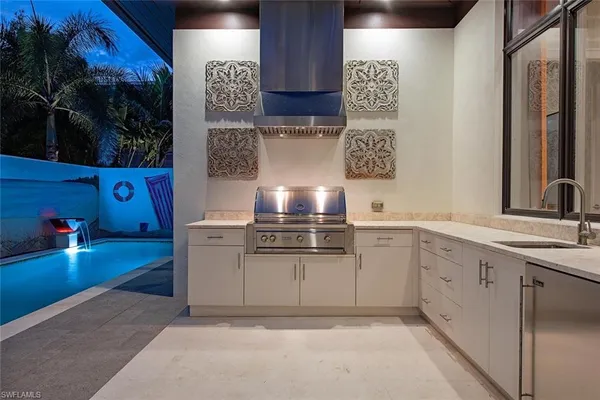 a view of an entryway with a floor to ceiling window